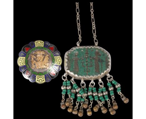 A Mexican sterling silver amulet pendant necklace, and a Peruvian silver and 18ct gold brooch, 51.1mm, 79.1g total (2) . Cond