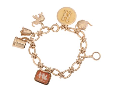 A Vintage 9ct gold fancy curb link charm bracelet, maker JG&S, Birmingham 1961, with 1 x 18ct cameo charm, and 6 x 9ct charms