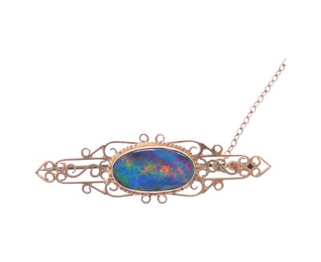A Vintage 9ct gold black opal doublet brooch, openwork form, unmarked mount tests as 9ct, 52.5mm, 4g . Condition Report:Opal 