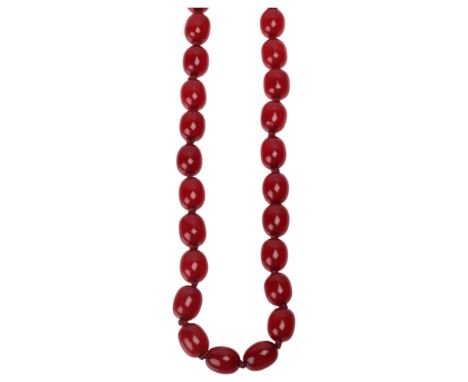 A Vintage single-strand cherry amber bead necklace, beads measure approx 12.5mm, 70cm, 50.7g . Condition Report:1 end bead ha