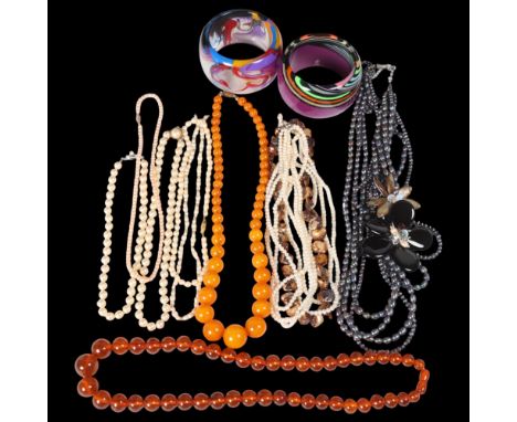 Various jewellery, including multi-strand pearl bead necklace, amber bead necklace, pair of Sobral bangles, etc . Condition R
