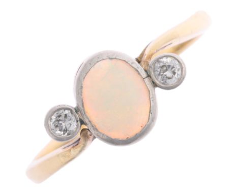 An 18ct gold three stone opal and diamond crossover ring, rub over set with oval cabochon opal and old European-cut diamonds,