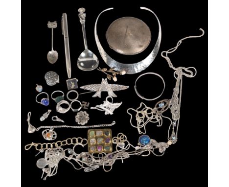 A quantity of silver jewellery, including powder compact, neck torque, pendant necklaces, etc . Condition Report:Lot sold as 