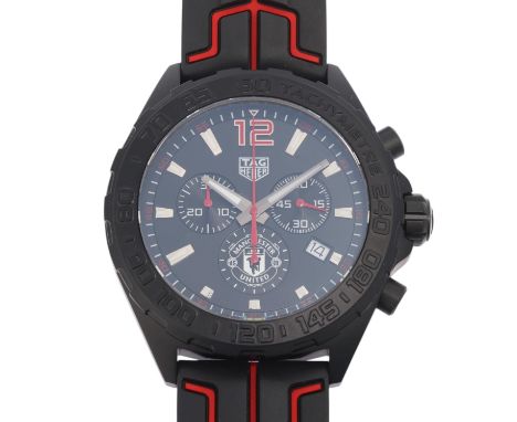 TAG HEUER - a black PVD stainless steel Formula 1 'Manchester United' quartz chronograph calendar wristwatch, ref CAZ101J, ci