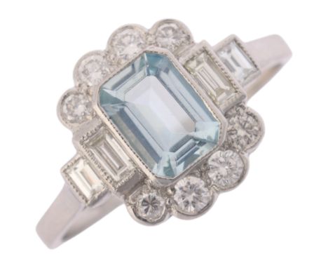 A platinum aquamarine and diamond cluster ring, millegrain set with 0.65ct octagonal step-cut aquamarine, surrounded by moder