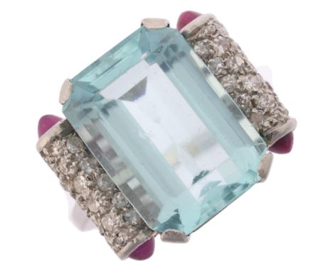 An aquamarine ruby and diamond cocktail ring, circa 1940, centrally set with a 9.20ct octagonal step-cut aquamarine flanked b