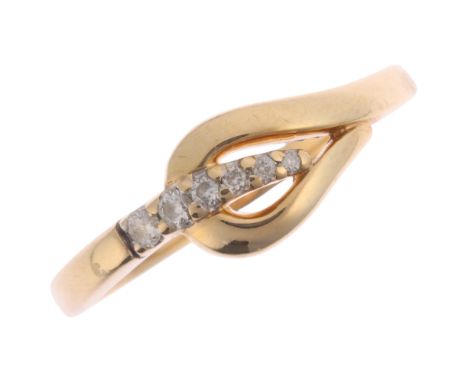A 9ct gold diamond whiplash ring, set with graduated modern round brilliant-cut diamonds, total diamond content approx 0.1ct,