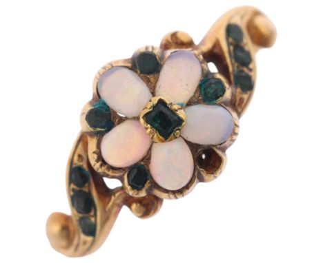An Antique Victorian 18ct gold opal chrysolite 'Forget-Me-Not' ring, circa 1850, set with oval cabochon opals, unmarked mount
