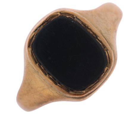 A 9ct gold onyx signet ring, maker HVS, setting height 11.1mm, size K, 1.8g . Condition Report:Onyx panel is worn around edge