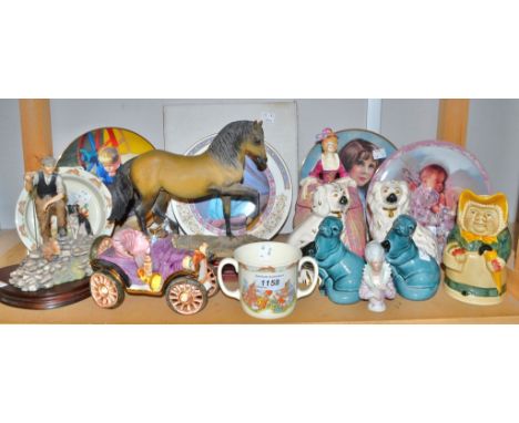 A pair of Royal Doulton miniature mantel dogs; an Art Deco powder bowl and cover as a lady in 18th century dress, hand painte