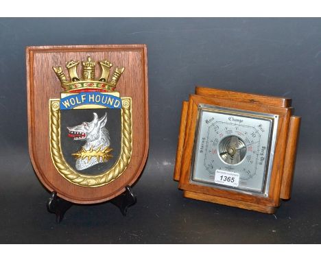 An Art Deco aneroid wall barometer, oak case;  a Wolfshound plaque (2)