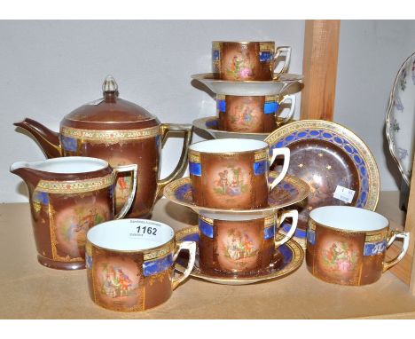 A Continental Czecoslovakia porcelain six setting tea service, transfer printed with figures in landscapes, inc teapot, milk 