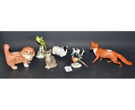 A Beswick model of a fox, 23cm long; a Beswick Ram, ginger cat, spaniel, pheasant; a Royal Doulton model of a grey kitten; et