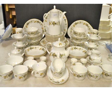 An extensive Royal Doulton Larchmont pattern tea and dinner service, including tea and coffee pots, cups, saucers, dinner and