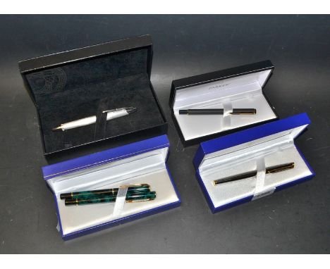 A Waterman fountain pen, stainless steel body, medium nib, boxed; another;  a parker;  a Versace roller ball pen, boxed,  pap