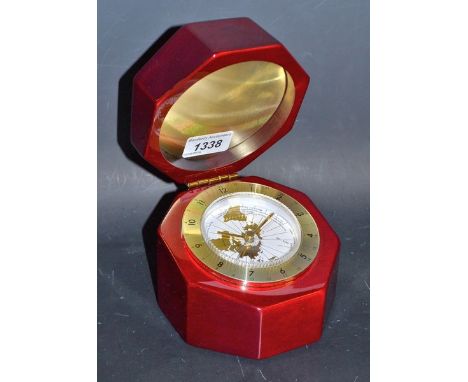 A desktop maritime clock, mahogany hinged case, boxed
