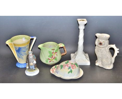 A Mailing lustre cheese dish; a Carlton Ware Australian design jug; a Royal Doulton candle stick; a spill vase as a figure; a