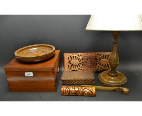 Treen - A carved expanding book rest; a diah; a letter opener; a tribal carving; a cigarette box;a table lamp; etc