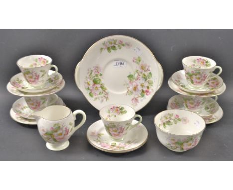 A Royal Doulton Apple Blossom pattern part tea service