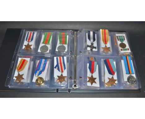 Medals & Decorations: an album of reproduction and original mainly UK medals and decorations: copy VC, GC, DFC, MC, DSC (2) &