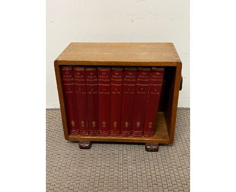 A light oak Art Deco book stand with eight "The book of Knowledge" Waverley 