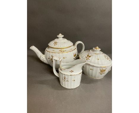 A Worcester Chamberlain teapot, sucrier and milk jug 