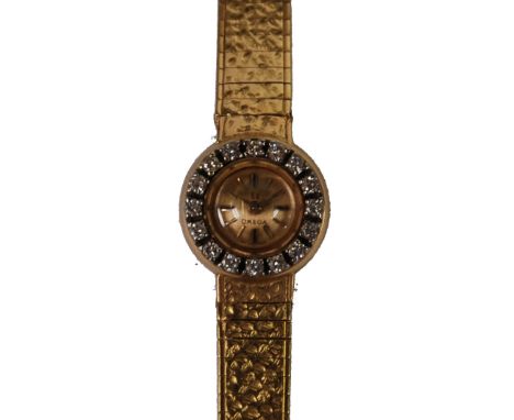 LADY'S OMEGA SWISS 18ct GOLD BRACELET WATCH, with mechanical movement, the small circular gold dial with batons, the bezel cl