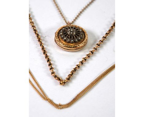 9ct GOLD AND METAL TINY SEED PEARL SET LOCKET on a metal chain, a 9ct gold CHAIN and another  unmarked yellow metal FINE CHAI