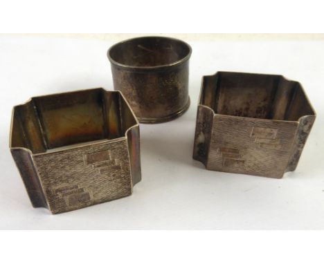 PAIR OF GEORGE V ART DECO ENGINE TURNED SILVER SQUARE NAPKIN RINGS, by Walker and Hall, Sheffield 1933, TOGETHER WITH A VICTO