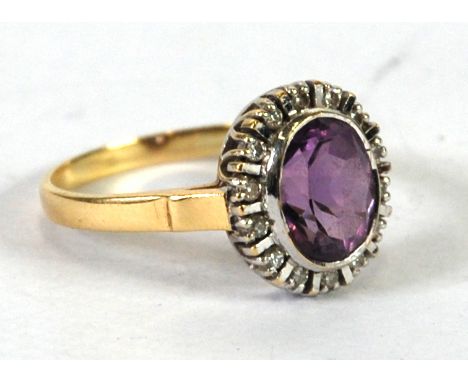 18ct GOLD, AMETHYST AND DIAMOND CLUSTER RING, set with centre oval amethyst and surround of fourteen tiny diamonds, 4gms  