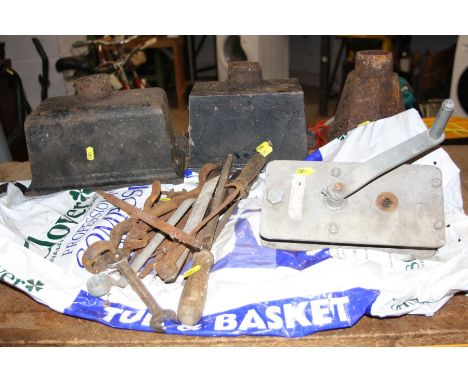 A TRAY CONTAINING CAST IRON GUTTER HOPPERS, a manual winch and a variety of hand tools