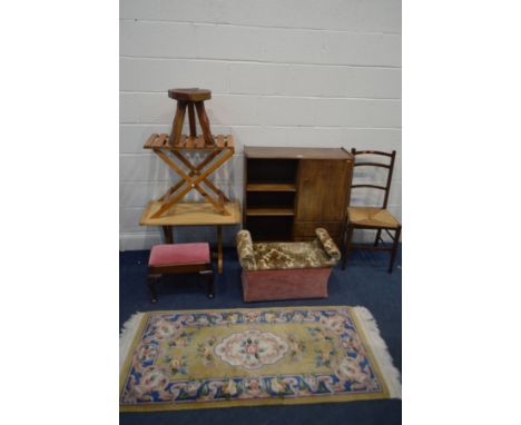 A QUANTITY OF OCCASIONAL FURNITURE, to include a walnut bookcase, a pine coffee table, folding slatted pine table, rustic sto