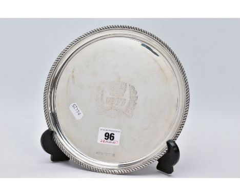 A SILVER '1977 QUEENS SILVER JUBILEE' SALVER, plain polished circular salver, with a central engraved '1977 The Queens Silver