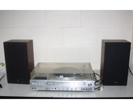 A TOSHIBA SM3350 VINTAGE MUSIC CENTRE and a pair of Toshiba speaker (PAT fail due to uninsulated plug  but working  apart fro