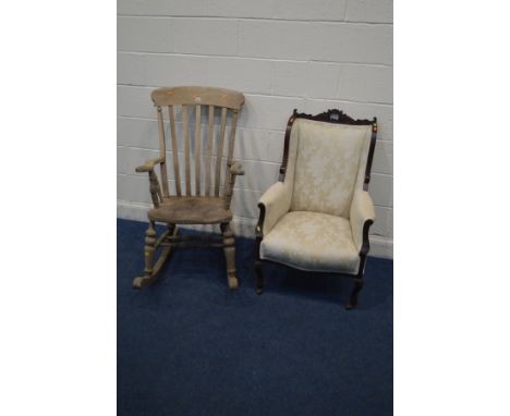 AN EDWARDIAN MAHOGANY CREAM UPHOLSTERED ARMCHAIR, on ceramic casters, together with a stripped beech and ash rocking chair (2