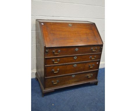 A DISTRESSED GEORGIAN OAK BUREAU, with three long graduated drawers, on bracket feet, width 92cm x depth 54cm x height 102cm 