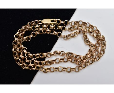 A YELLOW METAL ROLO LINK CHAIN, textured rolo links fitted with a lobster claw clasp, stamped '375', length 440mm, approximat