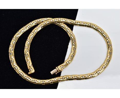 AN 18CT GOLD ARTICULATED CHAIN, fitted with an integrated box clasp and an additional figure of eight safety clasp, hallmarke