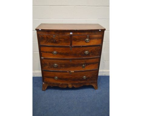 A GEORGIAN FLAME MAHOGANY CHEST OF TWO SHORT OVER THREE LONG GRADUATING DRAWERS, on outsplayed bracket feet, width 109cm x de