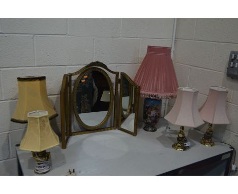 A GILT WOOD TRIPLE DRESSING MIRROR, together with five various table lamps, including one ceramic cloisonne lamp, all with sh