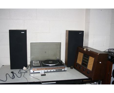 A FERGUSON STUDIO 20D MUSIC CENTRE with two speakers (PAT fail but working, turntable slow to start, arm has too much resista