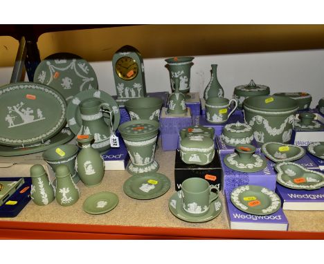 A COLLECTION OF BOXED AND UNBOXED WEDGWOOD GREEN JASPERWARE, including salt and pepper pots, a quartz clock, a pair of oval p