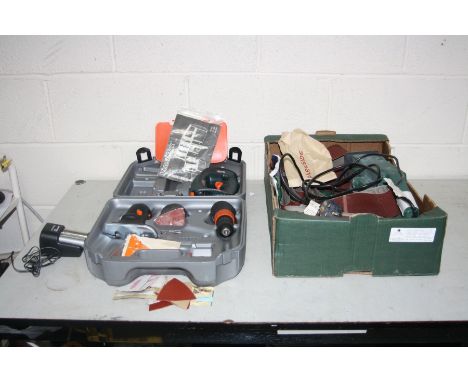 A BLACK AND DECKER QUATTRO  with four batteries, charger, three attachments and handle and a Parkside Belt Sander with spare 