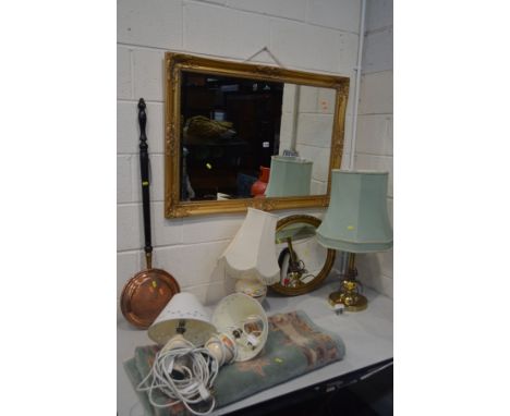 A MODERN FOLIATE GILT ON RESIN BEVELLED EDGE WALL MIRROR, 103cm x 74cm, along with an oval mirror, a brass table lamp, three 