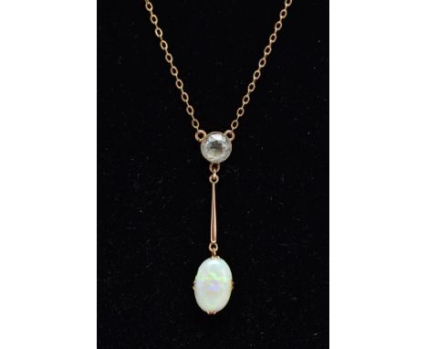 AN EARLY 20TH CENTURY OPAL AND AQUAMARINE TWO STONE PENDANT, an oval opal measuring approximately 21.0mm x 18.0mm, suspended 