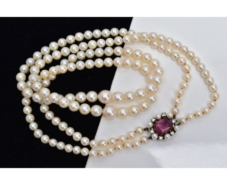 A CULTURED PEARL NECKLACE, designed with two strands of graduated cultured pearls, measuring approximately 4.5mm to 8.1mm, fi