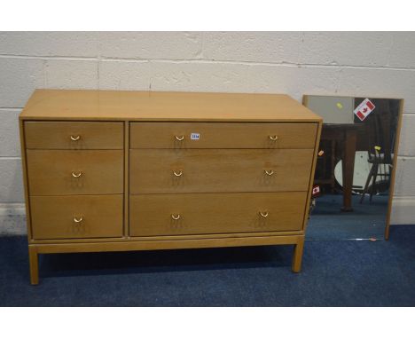 JOHN AND SYLVIA REID FOR STAG, a low oak chest of six drawers, with rounded brass handles, width 113cm x depth 43cm x height 