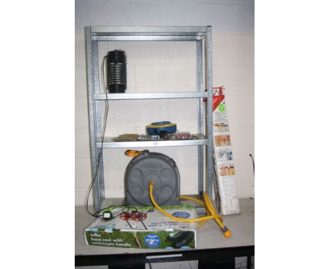 A GALVANISED GARAGE SHELVING UNIT, a hose reel, three locks, a tool caddy, a hose reel cart, and electric insect repellor (PA