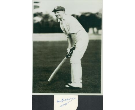 Cricket Don Bradman signed card cutting accompanied with vintage 10x8 inch black and white photo. Good condition Est.