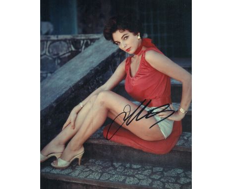 Joan Collins signed 10x8 inch vintage colour photo. Good condition Est.